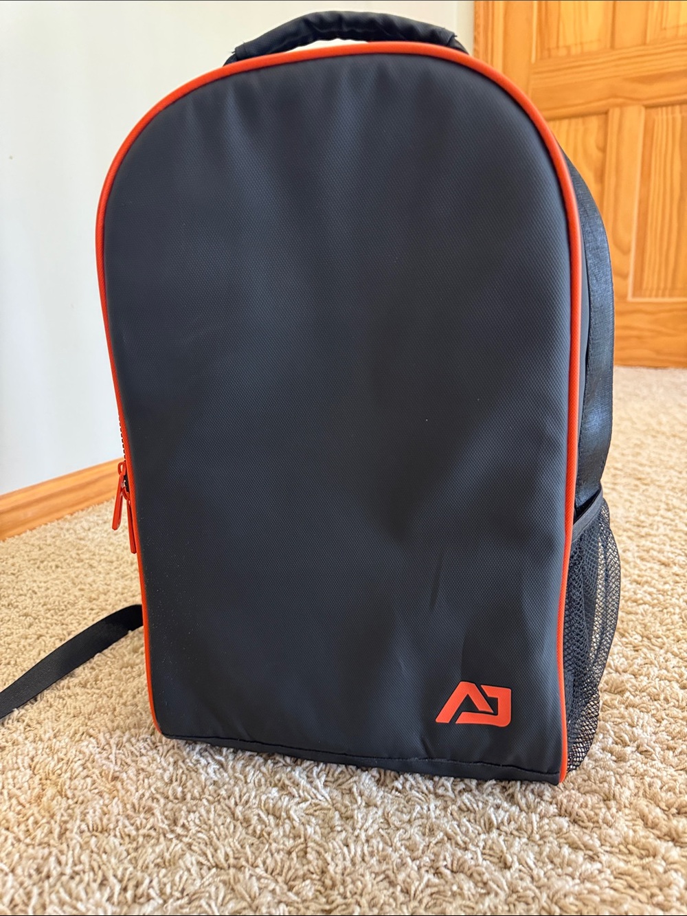 Atley James Men's Medium Backpack Bag, Black w/ Orange Piping